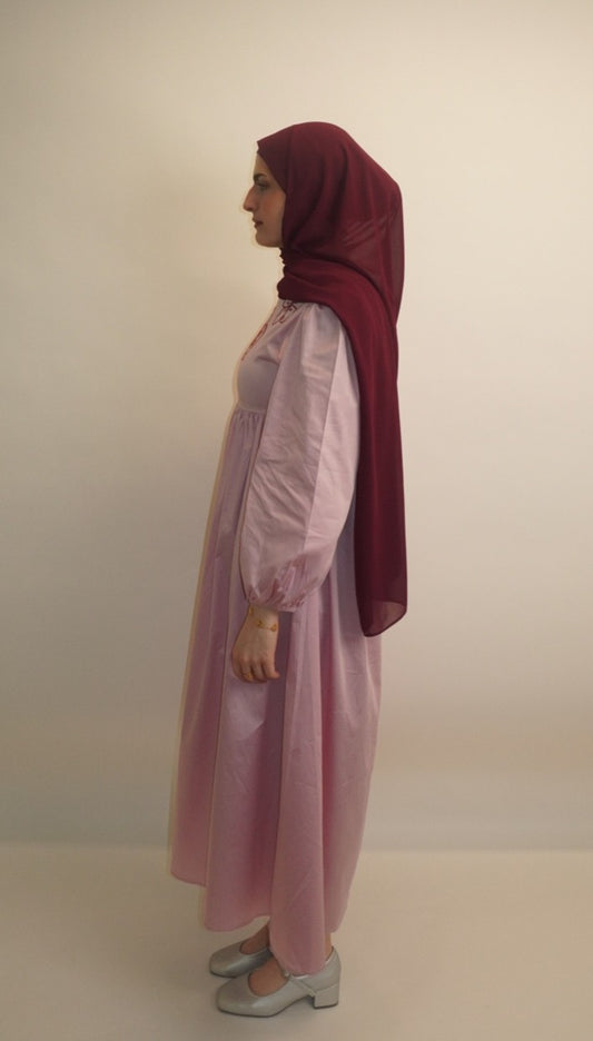 Pink cotton sateen midaxi dress side view, showing structured bodice and voluminous sleeves